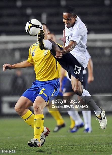 Ricardo Clark of USA vies for the ball with Daniel Andersson of Sweden during their international friendly match at the Home Depot Centre in Carson,...