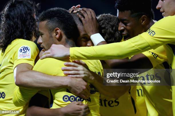 Kylian Mbappe of Paris Saint-Germain Football Club or PSG celebrates scoring his teams second goal of the game with team mates during the Ligue 1...