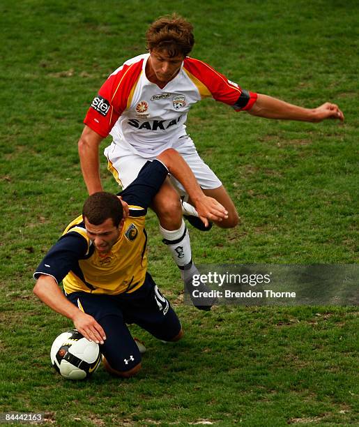 Glen Trifiro of the Mariners competes with the United defence during the National Youth League round 18 match between the Central Coast Mariners and...