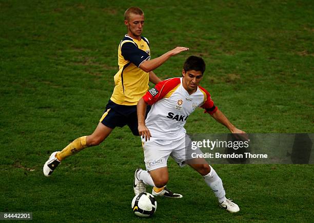 Michael Debono of United competes with the Mariners defence during the National Youth League round 18 match between the Central Coast Mariners and...