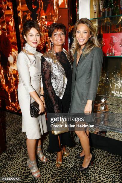 Elsa Zylberstein, Baccarat CEO Daniela Riccardi and Laura Smet attend the Baccarat Goldfinger party in paris on September 8, 2017 in Paris, France.