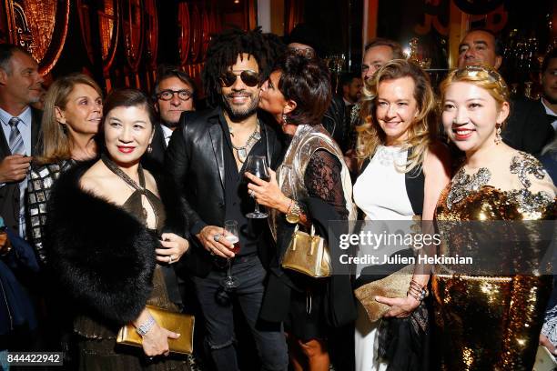 Mrs Song, Lenny Kravitz, Baccarat CEO Daniela Riccardi, Caroline Scheufele and Baccarat owner Coco Chu attend the Baccarat Goldfinger party in paris...