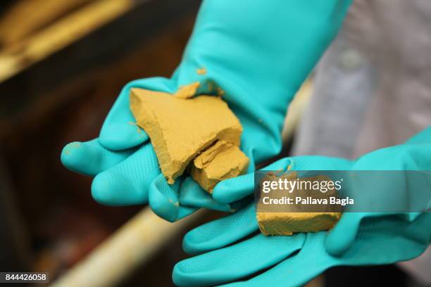 Inside Indias highly secure and rarely visited uranium processing facility at Turamidih Uranium Mill in the Jadugoda complex. The yellow substance...