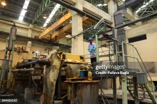 Inside Indias highly secure and rarely visited uranium processing facility at Turamidih Uranium Mill in the Jadugoda complex. The yellow substance...