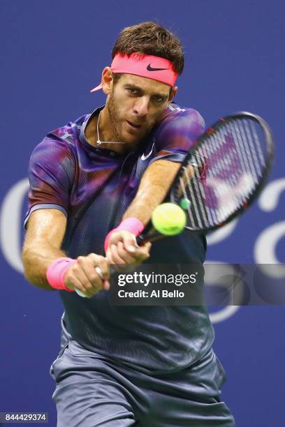 Juan Martin del Potro of Argentina returns a shot against Rafael Nadal of Spain during their Men's Singles Semifinal match on Day Twelve of the 2017...