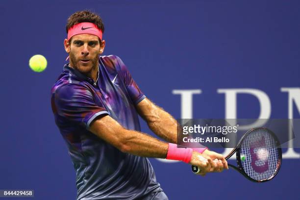 Juan Martin del Potro of Argentina returns a shot against Rafael Nadal of Spain during their Men's Singles Semifinal match on Day Twelve of the 2017...