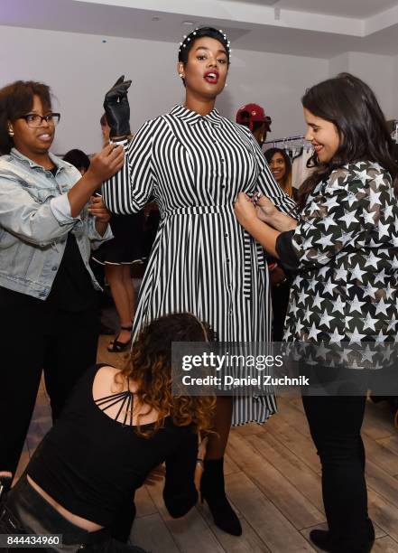 Model Precious Lee poses backstage during the Dia&Co fashion show and industry panel at the CURVYcon at Metropolitan Pavilion West on September 8,...