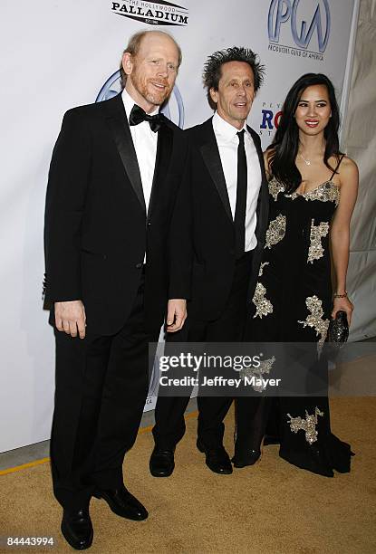 Ron Howard, Brian Grazer and Chau-Giang Thi Nguyen arrive at the 20th Annual Producers Guild Awards at The Hollywood Palladium on January 24, 2009 in...