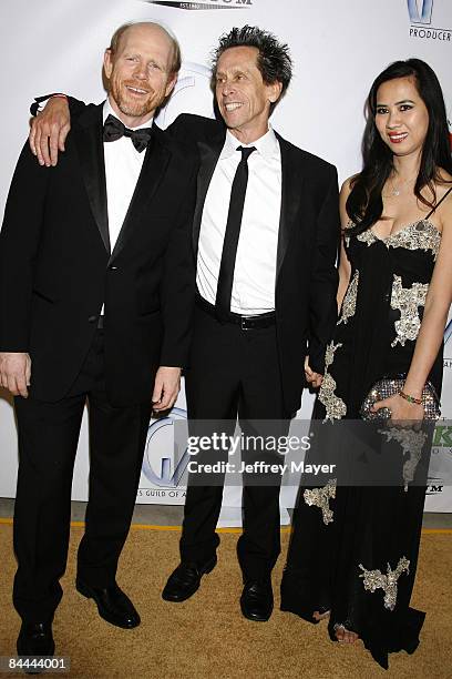 Ron Howard, Brian Grazer and Chau-Giang Thi Nguyen arrive at the 20th Annual Producers Guild Awards at The Hollywood Palladium on January 24, 2009 in...