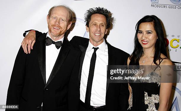 Ron Howard, Brian Grazer and Chau-Giang Thi Nguyen arrive at the 20th Annual Producers Guild Awards at The Hollywood Palladium on January 24, 2009 in...