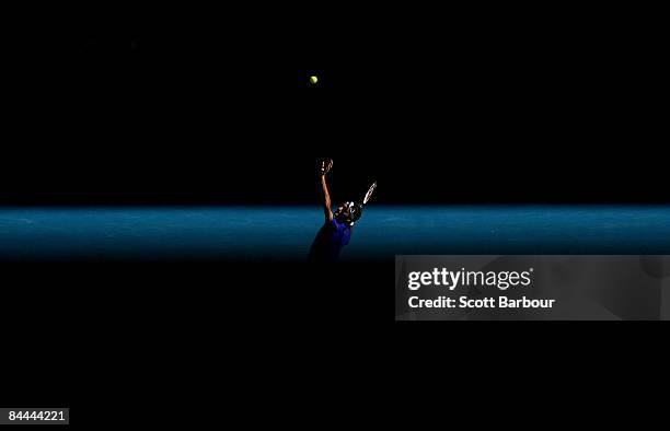 Roger Federer of Switzerland serves in his fourth round match against Tomas Berdych of the Czech Republic during day seven of the 2009 Australian...