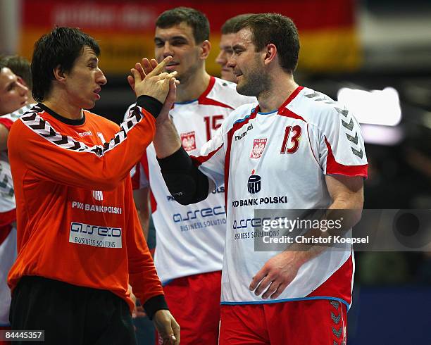 Slawomir Szmal of Poland and Bartosz Jurecki celebrate the 35-23 victory after the Men's World Handball Championships main round match group two...