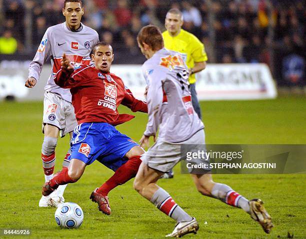 Ajaccio's midfielder Foued Kharzi fights for the ball with Paris' midfielder Clement Chantome during their French Cup football match on January 25,...