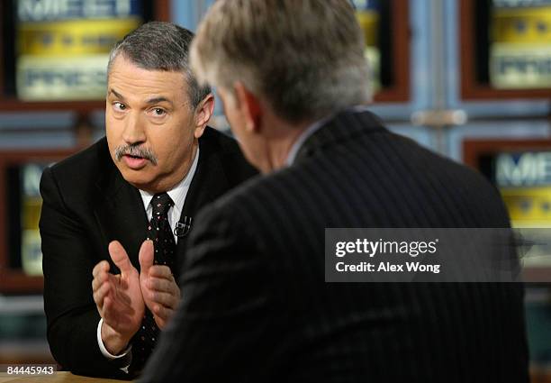 New York Times columnist Tom Friedman speaks as he is interviewed by moderator David Gregory during a taping of "Meet the Press" at the NBC studios...