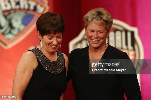 Naismith Memorial Basketball Hall of Fame Class of 2017 enshrinee Muffet McGraw poses with Naismith Memorial Basketball Hall of Famer Ann Meyers...
