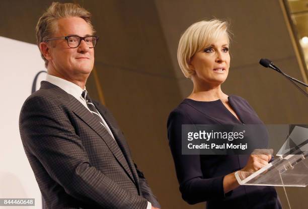 Hosts Joe Scarborough and Mika Brzezinski present an award onstage during the Daily Front Row's Fashion Media Awards at Four Seasons Hotel New York...