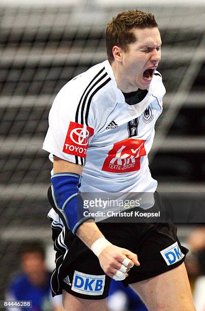 Sebastian Preiss of Germany shouts during the Men's World Handball Championships main round match group two between Norway and Germany at the Visnijk...