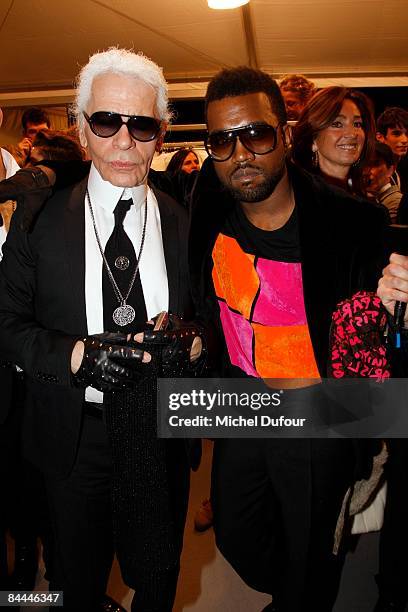 Karl Lagerfeld and Kanye West attend the Dior Homme fashion show during Paris Fashion Week Menswear Autumn/Winter 2009 on January 25, 2009 in Paris,...