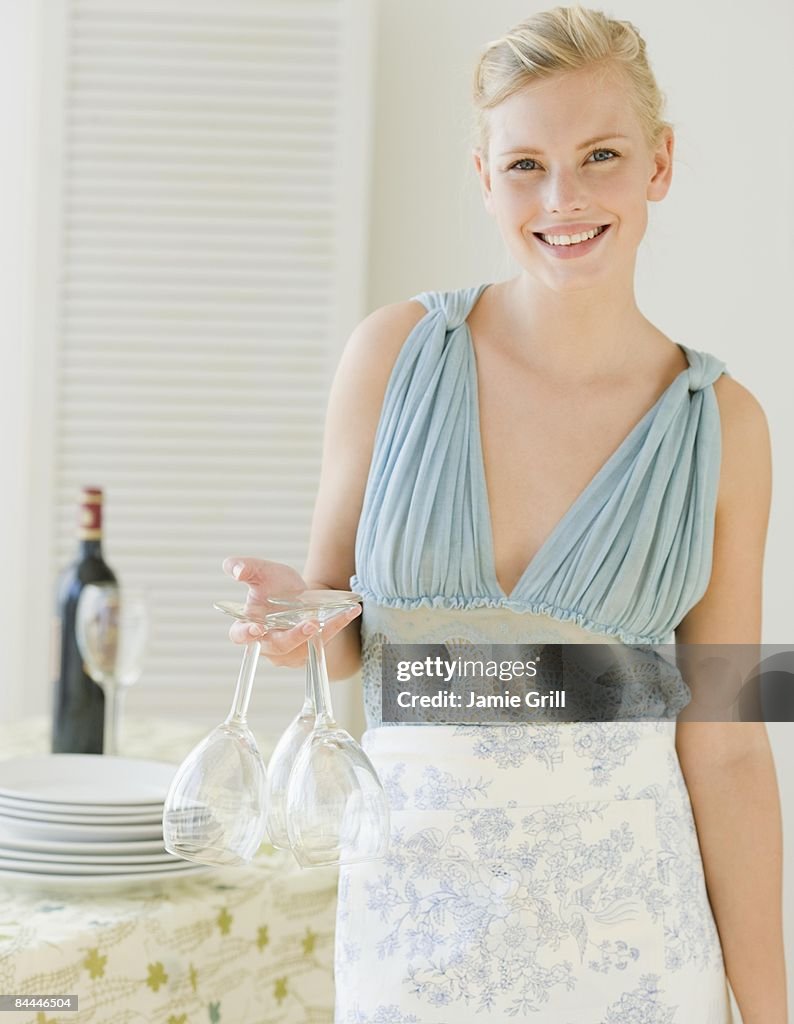 Young Woman preparing for a dinner party