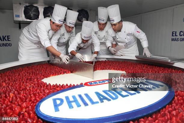 Chefs cut the Guinness World Record-winning biggest cheesecake, made by KRAFT Philadelphia, which is 2.5 meters in diameter, 55 centimeters high and...