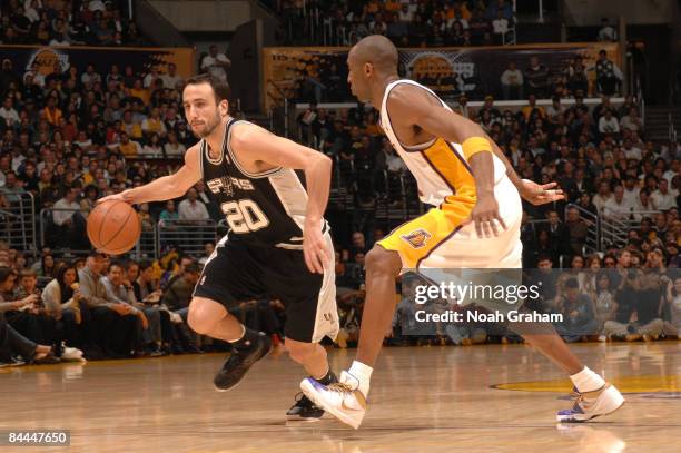 Manu Ginobili of the San Antonio Spurs handles the ball against Kobe Bryant of the Los Angeles Lakers at Staples Center on January 25, 2009 in Los...