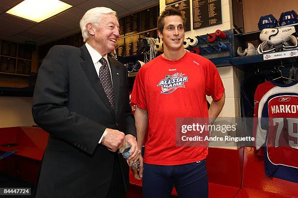 Legend Jean Beliveau and Eastern Conference All-Star Vincent Lecavalier of the Tampa Bay Lightning pose for a photo in the locker room prior to the...