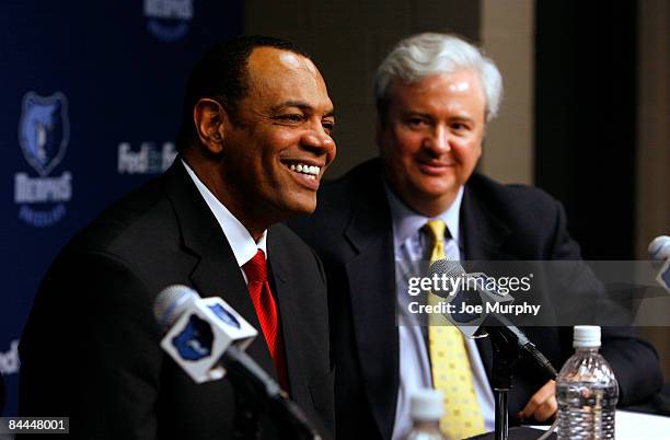 Lionel Hollins, Head coach of the Memphis Grizzlies and Chris Wallace, General Manager of the Memphis Grizzlies addresses the local media during a...