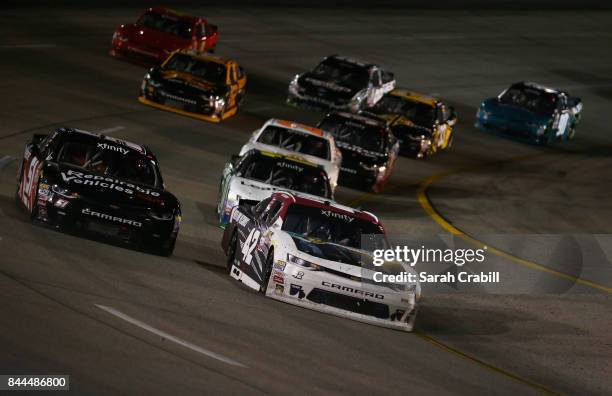 Tyler Reddick, driver of the BBR/Jason Aldean Chevrolet, leads a pack of cars during the NASCAR XFINITY Series Virginia529 College Savings 250 at...