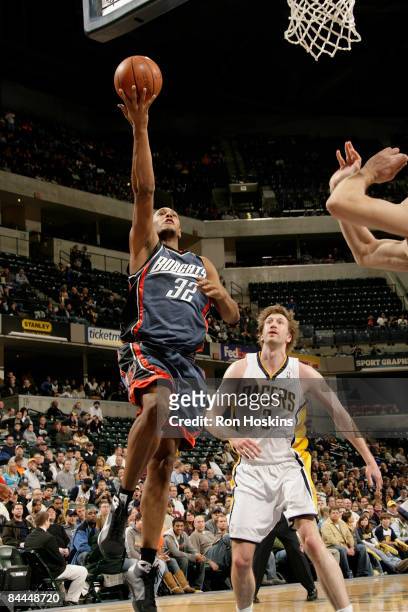 Boris Diaw of the Charlotte Bobcats drives to the basket past Troy Murphy of the Indiana Pacers at Conseco Fieldhouse on January 25, 2009 in...