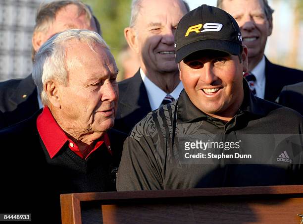 Pat Perez is congratulated by tournament host Arnold Palmer after Perez' three stroke victory on the Palmer Private course at PGA West during the...