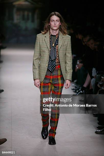 Model walks the runway at the Paul Smith fashion show during Paris Fashion Week Menswear Autumn/Winter 2009 at Couvent des Cordeliers on January 25,...