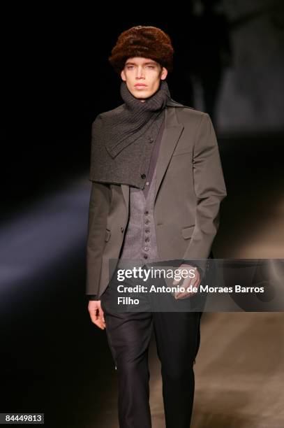 Model walks the runway at the Wooyoungmi fashion show during Paris Fashion Week Menswear Autumn/Winter 2009 on January 25, 2009 in Paris, France.