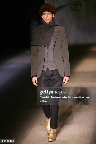 Model walks the runway at the Wooyoungmi fashion show during Paris Fashion Week Menswear Autumn/Winter 2009 on January 25, 2009 in Paris, France.
