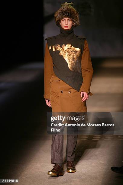 Model walks the runway at the Wooyoungmi fashion show during Paris Fashion Week Menswear Autumn/Winter 2009 on January 25, 2009 in Paris, France.