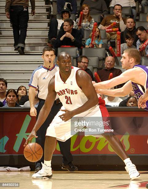 Nathan Jawai of the Toronto Raptors looks to back down defender Spencer Hawes of the Sacramento Kings during a game on January 25, 2009 at the Air...