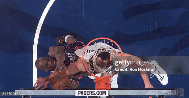 Emeka Okafor of the Charlotte Bobcats battles Jeff Foster of the Indiana Pacers at Conseco Fieldhouse on January 25, 2009 in Indianapolis, Indiana....