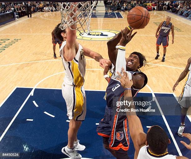 Gerald Wallace of the Charlotte Bobcats battles Jeff Foster of the Indiana Pacers at Conseco Fieldhouse on January 25, 2009 in Indianapolis, Indiana....