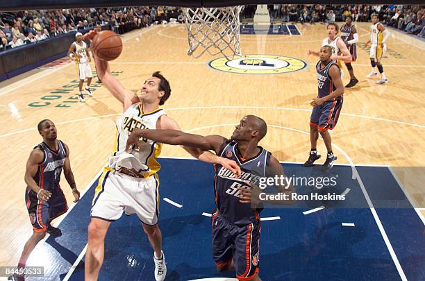 Jeff Foster of the Indiana Pacers battles Emeka Okafor of the Charlotte Bobcats at Conseco Fieldhouse on January 25, 2009 in Indianapolis, Indiana....