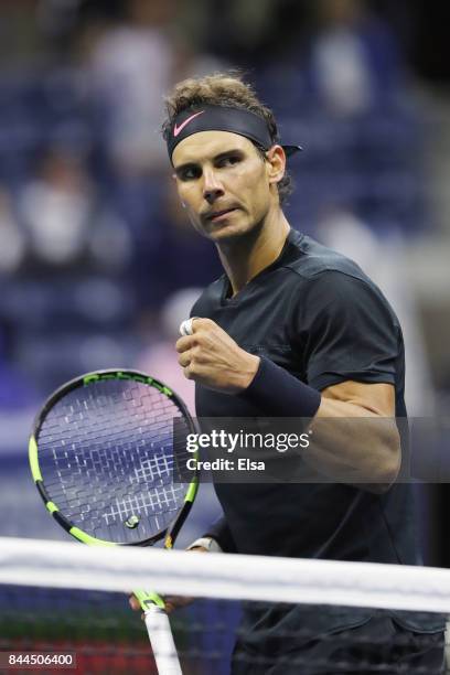 Rafael Nadal of Spain reacts after a shot against Juan Martin del Potro of Argentina during their Men's Singles Semifinal match on Day Twelve of the...