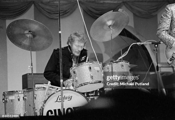 British drummer Ginger Baker performing on stage with Cream during their first live appearance at the Windsor Jazz and Blues Festival in Berkshire,...