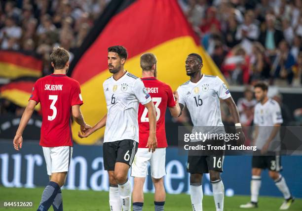 Jorgen Skjelvik, Jo Inge Berget of Norway, Sami Khedira, Antonio Rudiger of Germany after the FIFA 2018 World Cup Qualifier between Germany and...