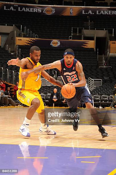 Chet Mason of the Anaheim Arsenal drives to the basket against Joe Crawford of the Los Angeles D-Fenders at Staples Center on January 25, 2009 in Los...
