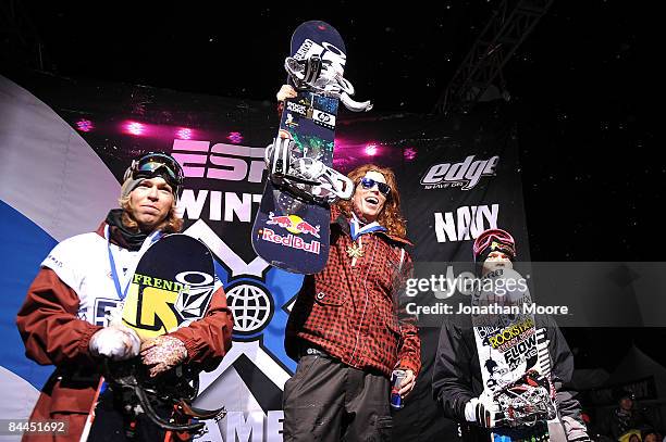 Gold medal winner Shaun White of Carlsbad, California celebrates along side silver medal winner Kevin Pearce of Norwich, Vermont and bronze medal...