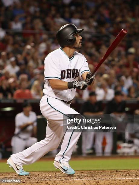 Reymond Fuentes of the Arizona Diamondbacks hits a two run home run against the San Diego Padres during the fifth inning of the MLB game at Chase...