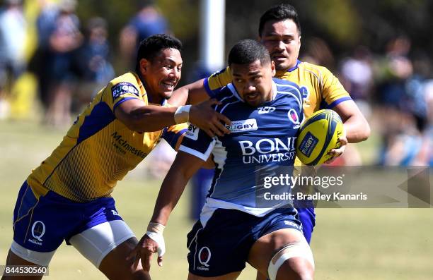 Chris Feauai-Sautia of Queensland Country breaks through the defencecduring the round two NRC match between Queensland Country and Brisbane on...