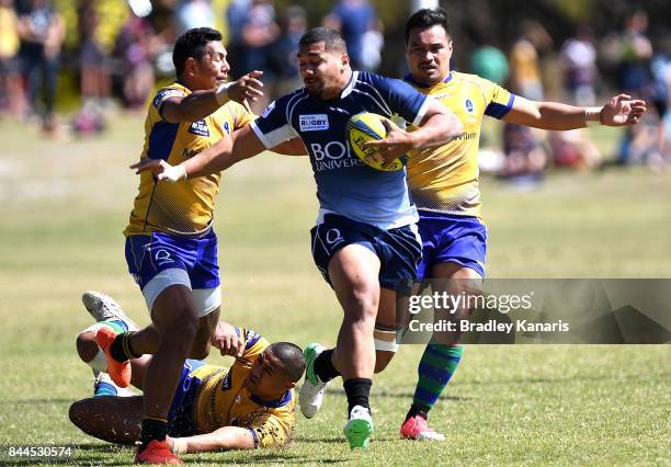 Chris Feauai-Sautia of Queensland Country breaks through the defencecduring the round two NRC match between Queensland Country and Brisbane on...