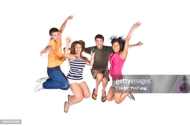 four young teenage boys and girls playing together on white background - hug full body isolated stock pictures, royalty-free photos & images
