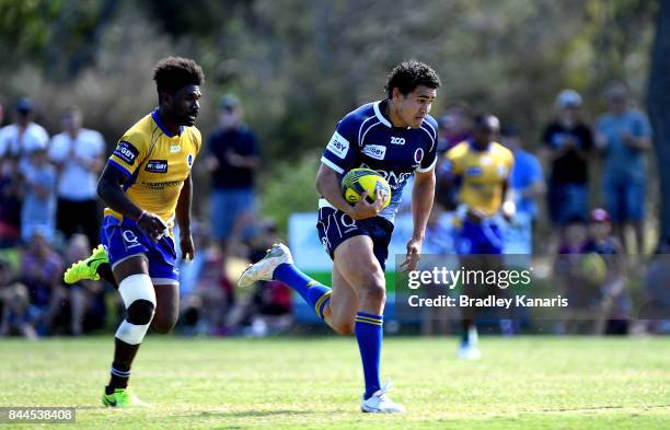 Izaia Perese of Queensland Country breaks away from the defence during the round two NRC match between Queensland Country and Brisbane on September...