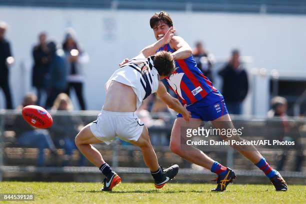 Sam Binion of the Knights and Toby Wooller of the Chargers contest the ball during the TAC Cup Final between Oakleigh and Northern Knights at...