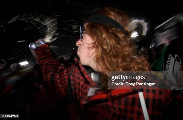 Shaun White of Carlsbad, California makes his way to the podium to receive the gold medal in the Men's Snowboard Superpipe Final at Winter X Games 13...